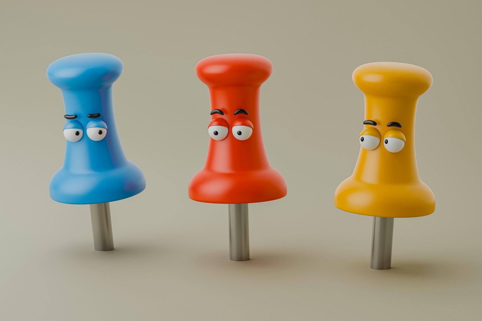 Push pins looking at each other