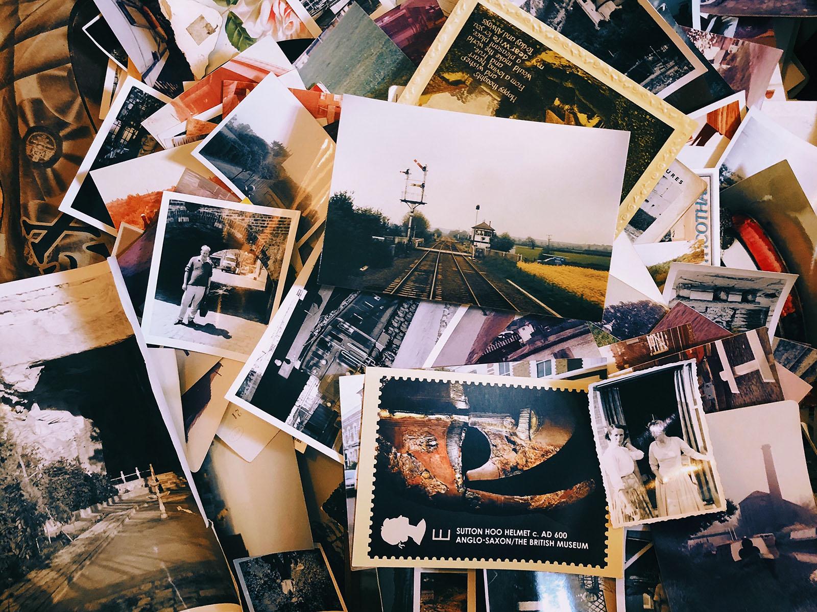 Pile of photographs - Image: https://unsplash.com/@jontyson