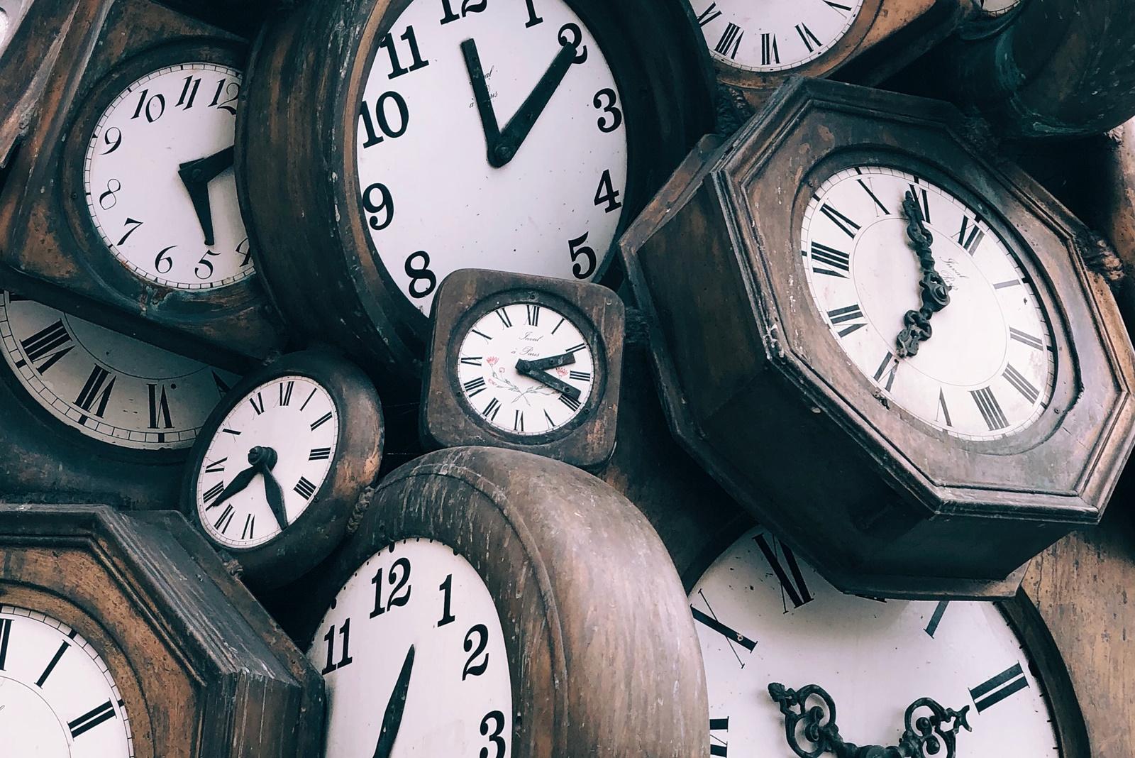 brown-and-white clocks - Image: https://unsplash.com/@jontyson