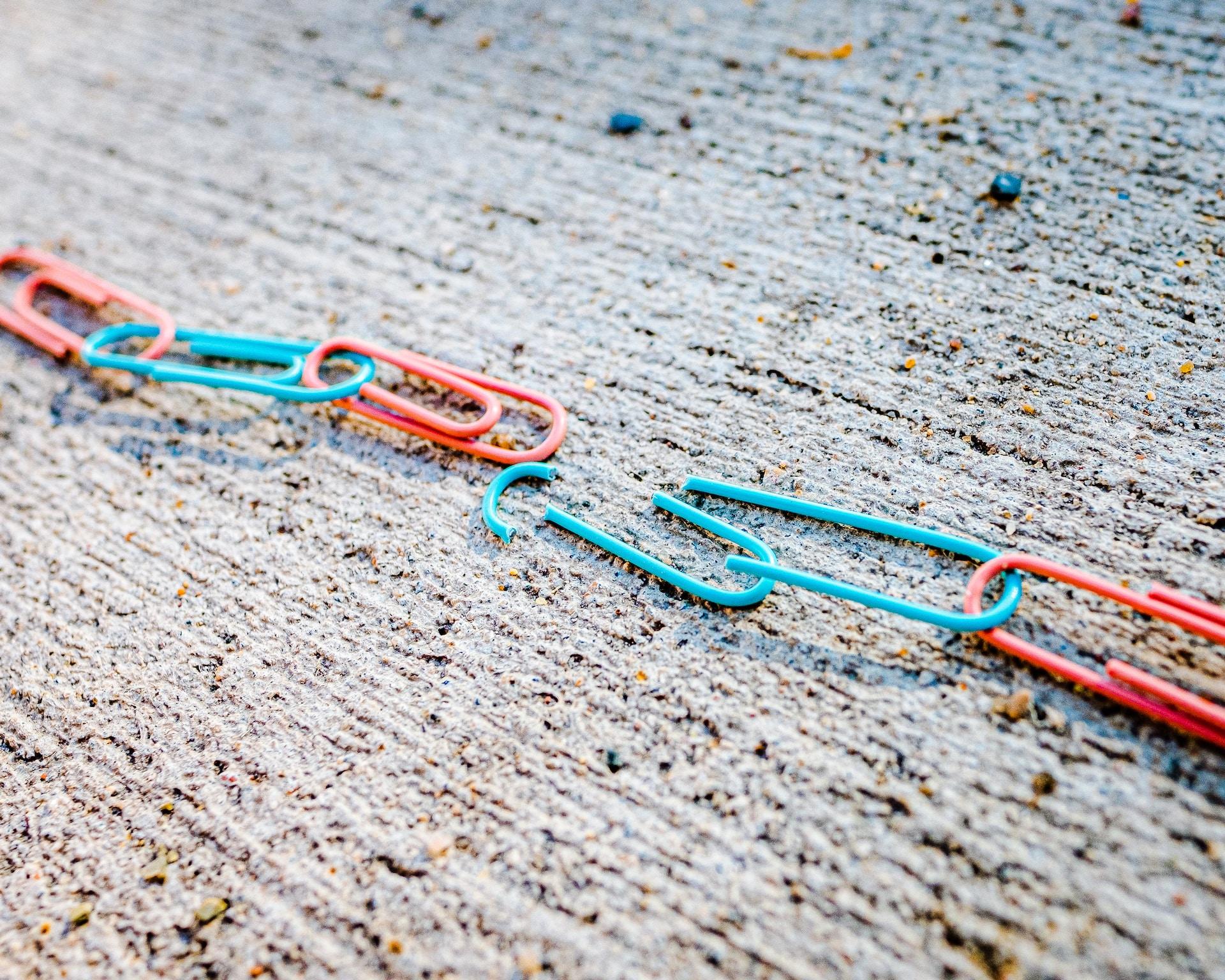 Broken link of paperclips - https://unsplash.com/@simmerdownjpg